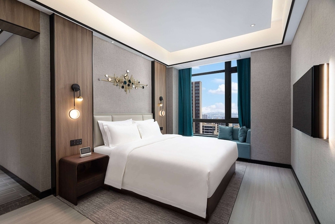 Imagen de la habitación del Hotel Microtel By Wyndham Xiangtan Tianyi. Foto 8