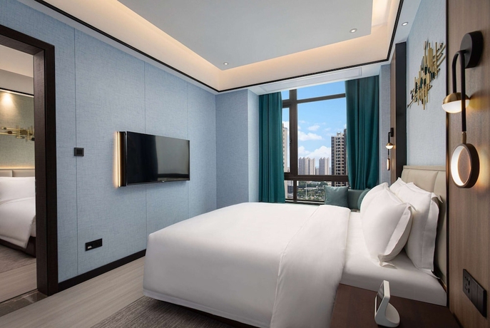 Imagen de la habitación del Hotel Microtel By Wyndham Xiangtan Tianyi. Foto 10