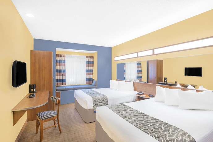 Imagen de la habitación del Hotel Microtel Inn And Suites By Wyndham Chili/rochester Airport. Foto 11
