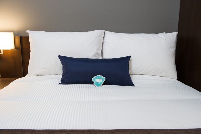 Imagen de la habitación del Hotel Microtel Inn And Suites By Wyndham Whitecourt. Foto 16