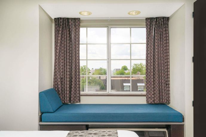Imagen de la habitación del Hotel Microtel Inn By Wyndham Bowling Green. Foto 11