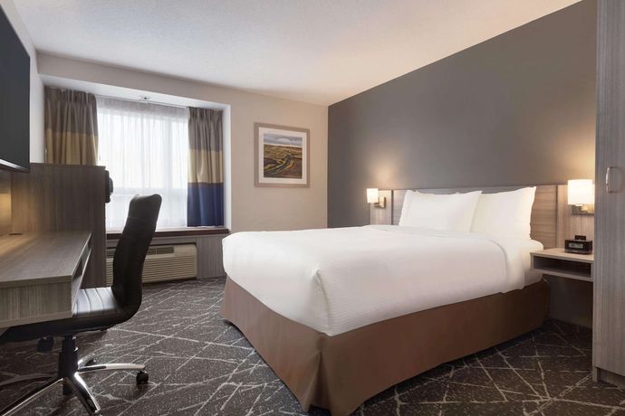 Imagen de la habitación del Hotel Microtel Inn & Suites By Wyndham Lloydminster. Foto 5