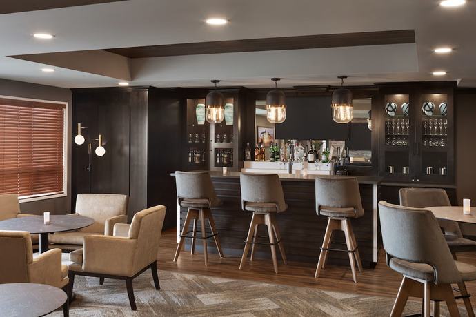 Imagen del bar/restaurante del Hotel Microtel Inn & Suites By Wyndham Lloydminster. Foto 2