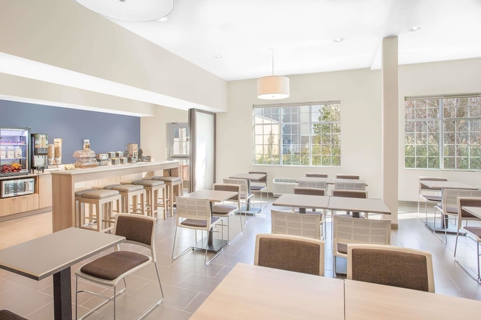 Imagen del bar/restaurante del Hotel Microtel Inn & Suites By Wyndham Ocean City. Foto 2