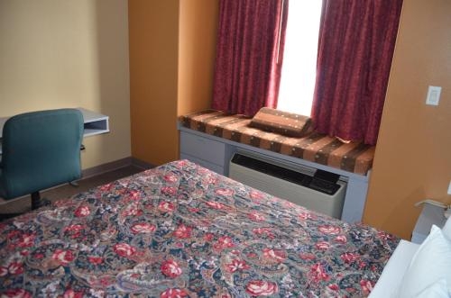 Imagen de la habitación del Hotel Microtel Inn and Suites By Wyndham Clarksville. Foto 5