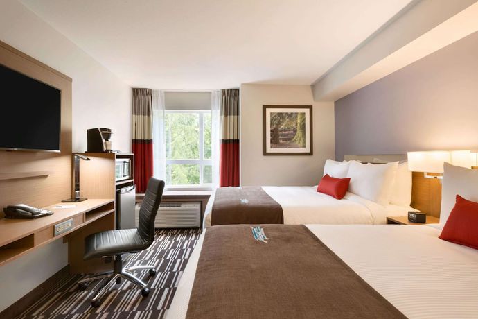 Imagen de la habitación del Hotel Microtel Inn and Suites By Wyndham Oyster Bay. Foto 7