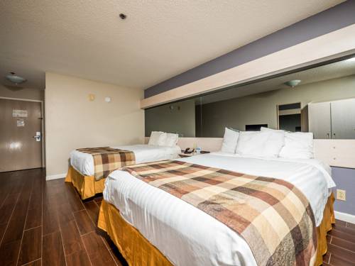 Imagen de la habitación del Hotel Microtel Inn and Suites By Wyndham Palm Coast I-95. Foto 12