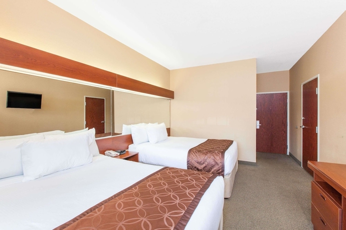 Imagen de la habitación del Hotel Microtel Inn and Suites By Wyndham Rogers. Foto 5