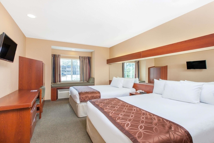Imagen de la habitación del Hotel Microtel Inn and Suites By Wyndham Rogers. Foto 6