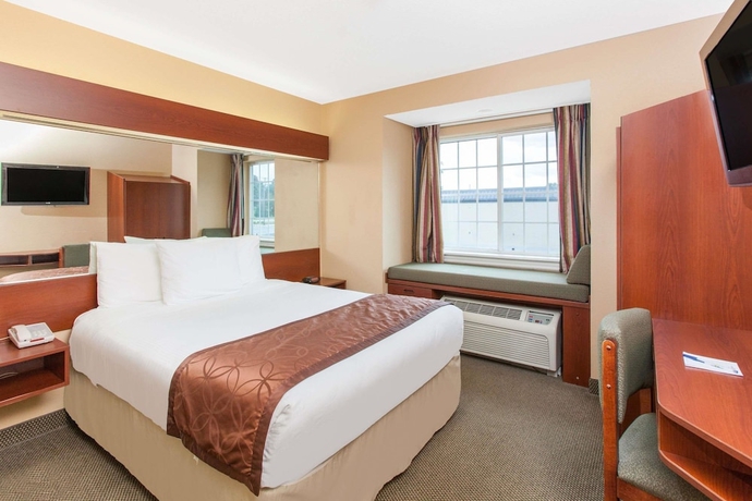 Imagen de la habitación del Hotel Microtel Inn and Suites By Wyndham Rogers. Foto 10