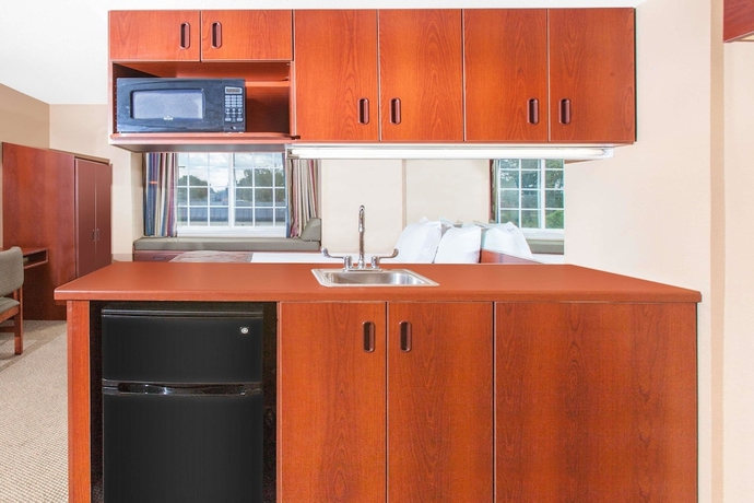 Imagen de la habitación del Hotel Microtel Inn and Suites By Wyndham Rogers. Foto 12