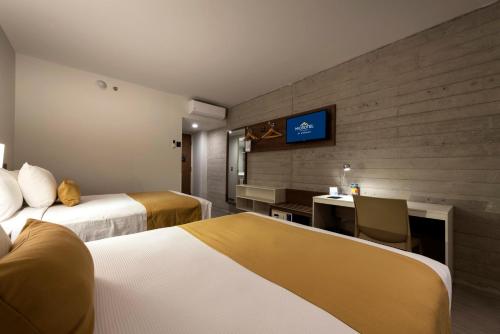 Imagen de la habitación del Hotel Microtel Inn and Suites by Wyndham Guadalajara Sur. Foto 9