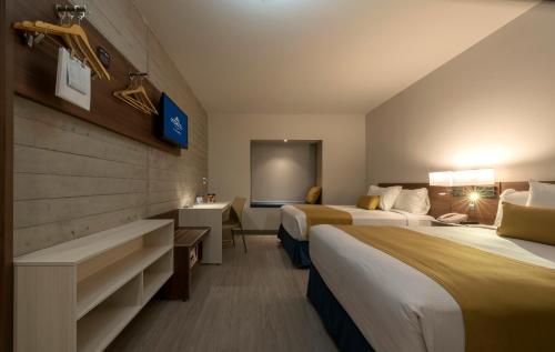 Imagen de la habitación del Hotel Microtel Inn and Suites by Wyndham Guadalajara Sur. Foto 10