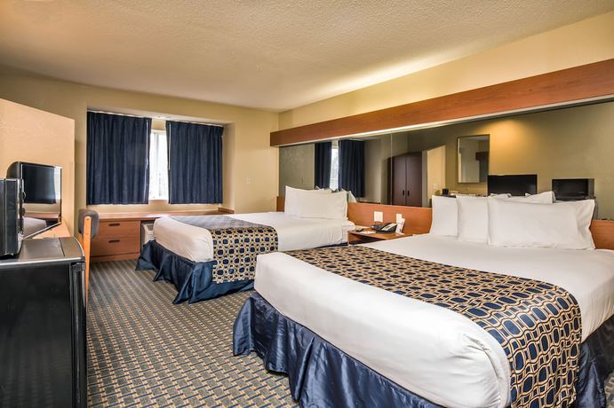 Imagen de la habitación del Hotel Microtel Inn and Suites by Wyndham Leesburg/Mt Dora. Foto 11