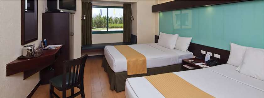 Imagen de la habitación del Hotel Microtel by Wyndham Cabanatuan. Foto 11