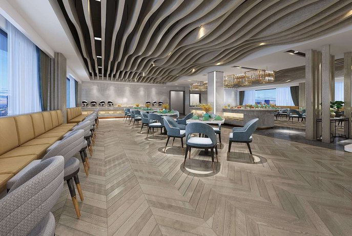 Imagen del bar/restaurante del Hotel Microtel by Wyndham Lijiang. Foto 3