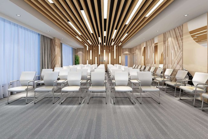 Imagen de los interiores del Hotel Microtel by Wyndham Lijiang. Foto 8
