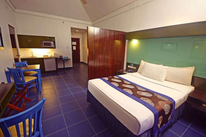 Imagen de la habitación del Hotel Microtel by Wyndham Puerto Princesa. Foto 4