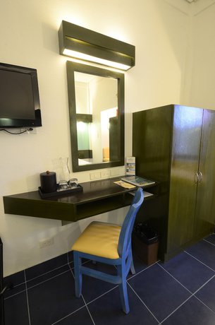 Imagen de la habitación del Hotel Microtel by Wyndham Puerto Princesa. Foto 11