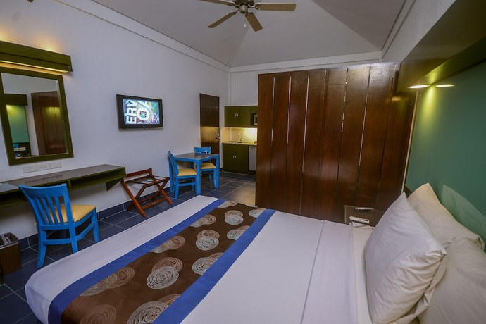Imagen de la habitación del Hotel Microtel by Wyndham Puerto Princesa. Foto 13