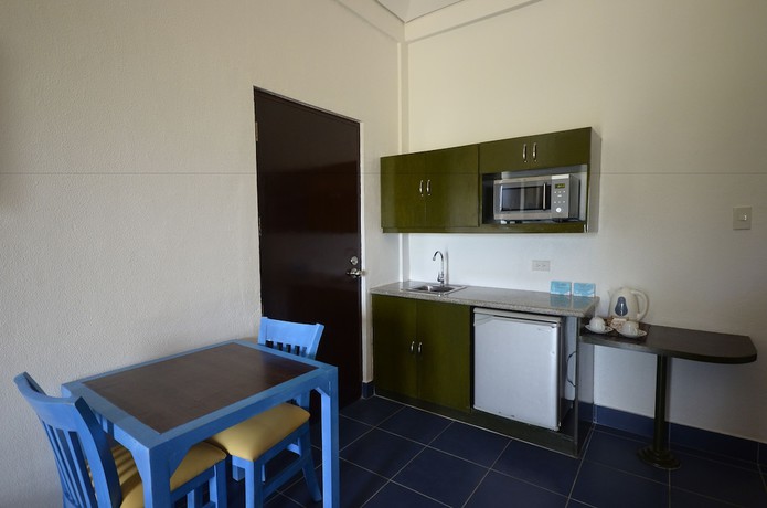 Imagen de la habitación del Hotel Microtel by Wyndham Puerto Princesa. Foto 16