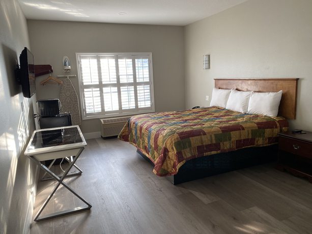 Imagen de la habitación del Hotel Mid City Inn and Suites. Foto 8