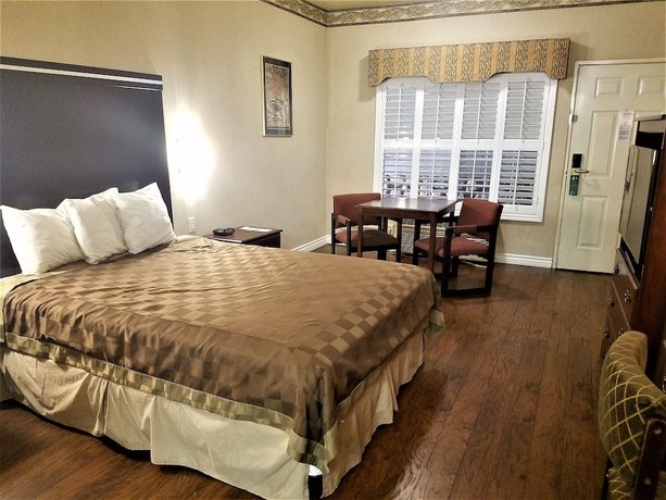 Imagen de la habitación del Hotel Mid City Inn and Suites. Foto 10