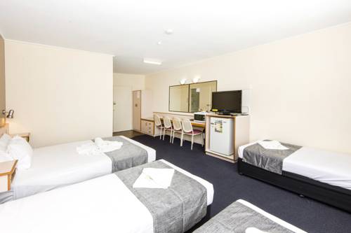 Imagen de la habitación del Hotel Mid City Motor Inn. Foto 1