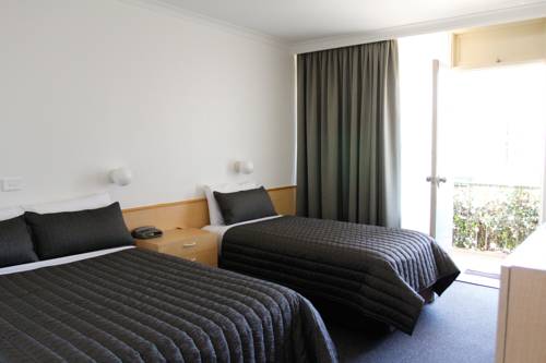 Imagen de la habitación del Hotel Mid City Motor Inn, Queanbeyan. Foto 2