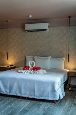 Imagen de la habitación del Hotel Mid Project. Foto 16