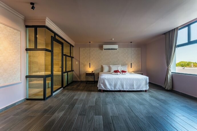 Imagen de la habitación del Hotel Mid Project. Foto 18