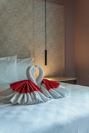 Imagen de la habitación del Hotel Mid Project. Foto 20