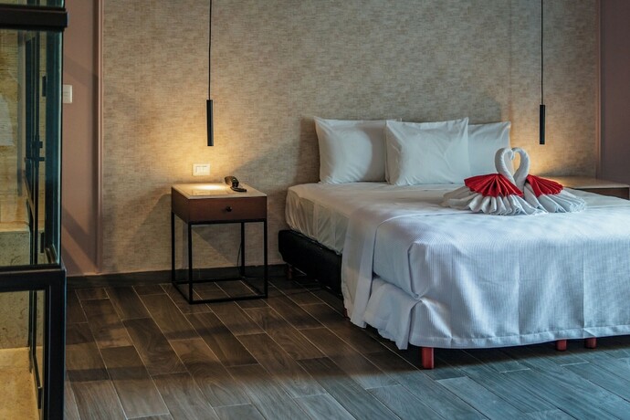 Imagen de la habitación del Hotel Mid Project. Foto 22