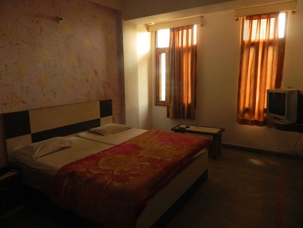 Imagen de la habitación del Hotel Mid Town, Bhilwara. Foto 4