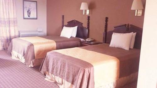 Imagen de la habitación del Hotel Mid Towne Inn and Suites. Foto 5