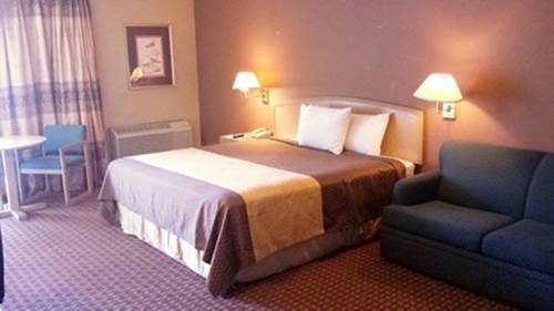 Imagen de la habitación del Hotel Mid Towne Inn and Suites. Foto 6