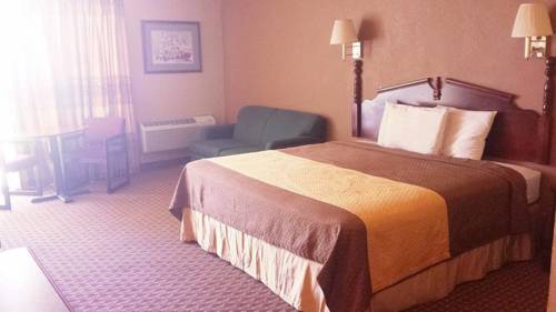 Imagen de la habitación del Hotel Mid Towne Inn and Suites. Foto 11