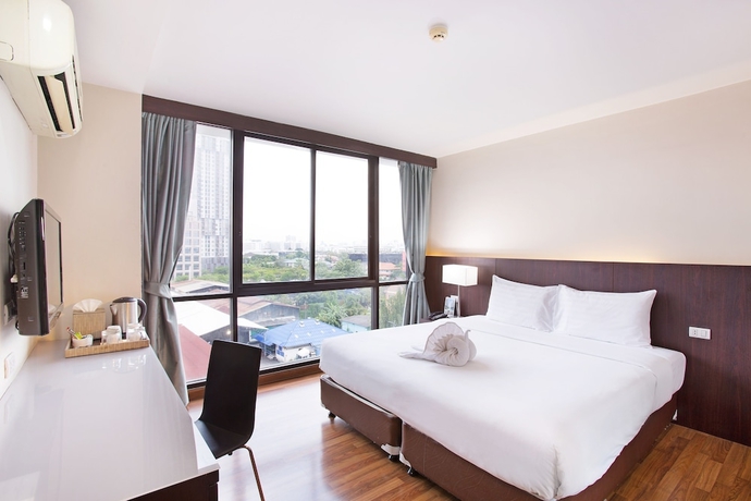 Imagen de la habitación del Hotel Mida Ngamwongwan. Foto 2