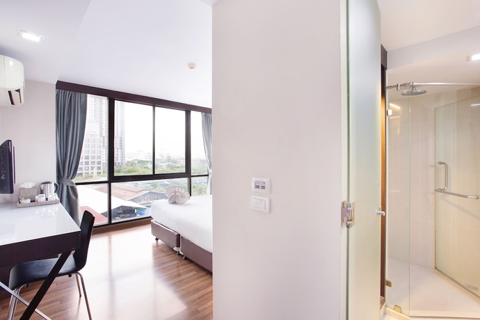 Imagen de la habitación del Hotel Mida Ngamwongwan. Foto 3