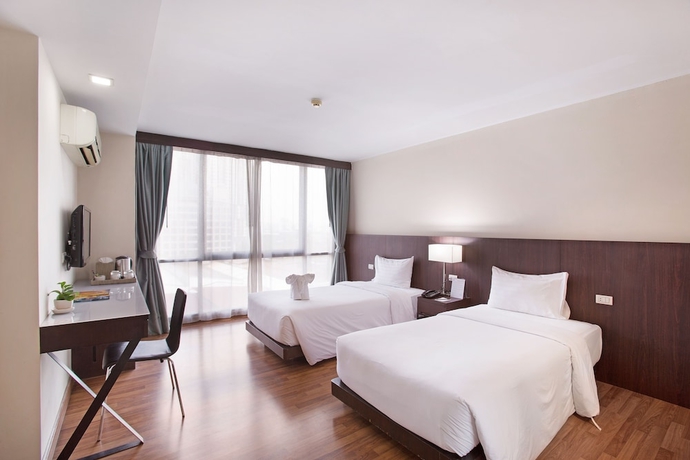 Imagen de la habitación del Hotel Mida Ngamwongwan. Foto 4