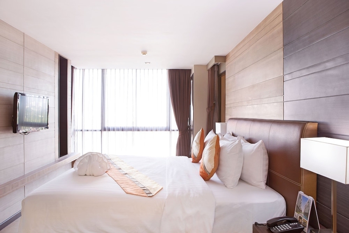 Imagen de la habitación del Hotel Mida Ngamwongwan. Foto 7