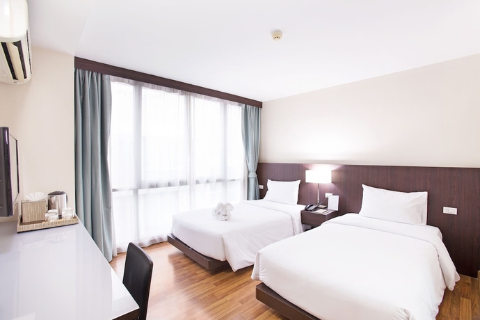Imagen de la habitación del Hotel Mida Ngamwongwan. Foto 8