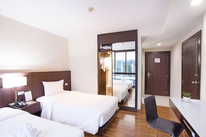 Imagen de la habitación del Hotel Mida Ngamwongwan. Foto 9