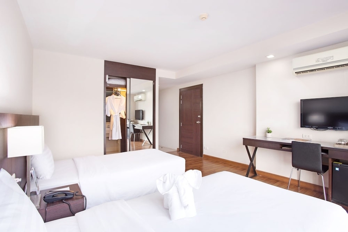 Imagen de la habitación del Hotel Mida Ngamwongwan. Foto 12