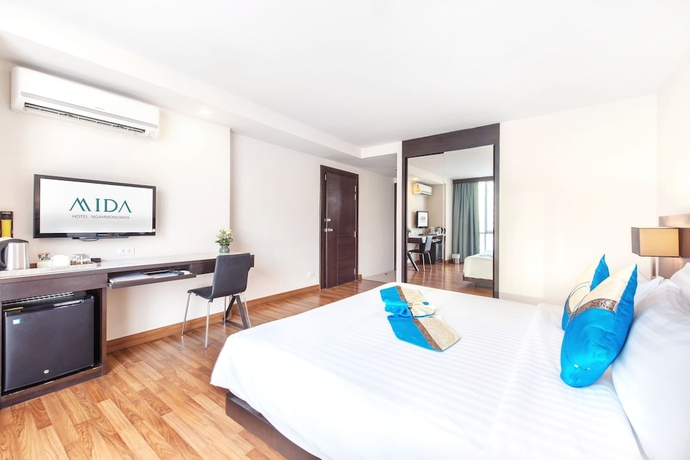 Imagen de la habitación del Hotel Mida Ngamwongwan. Foto 15