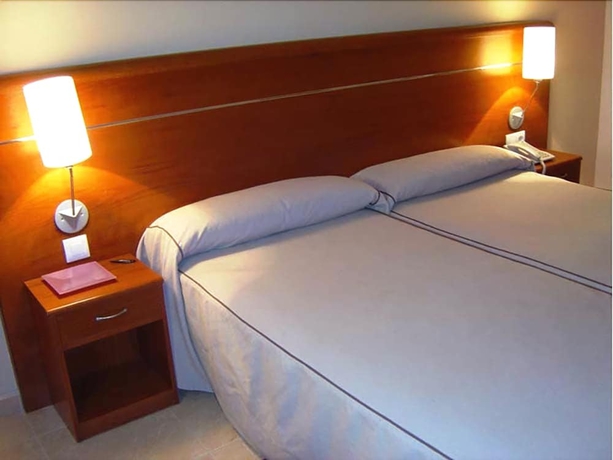 Imagen de la habitación del Hotel Midama. Foto 8