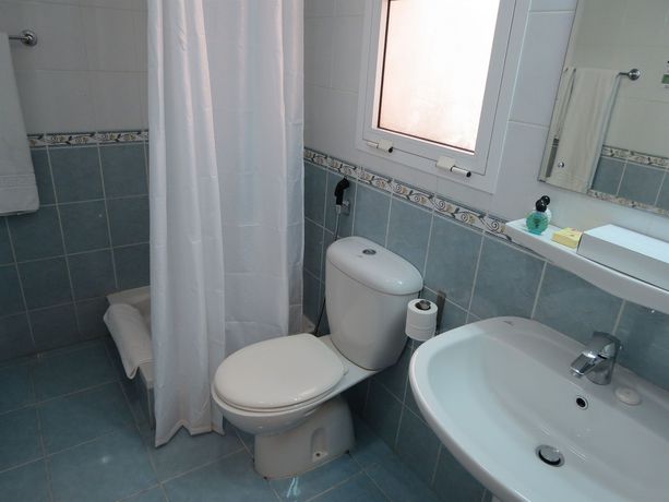Imagen de la habitación del Hotel Midan Suites. Foto 6