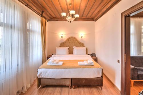 Imagen de la habitación del Hotel Midas Konak Otel. Foto 18
