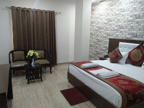 Imagen de la habitación del Hotel Midcity. Foto 19