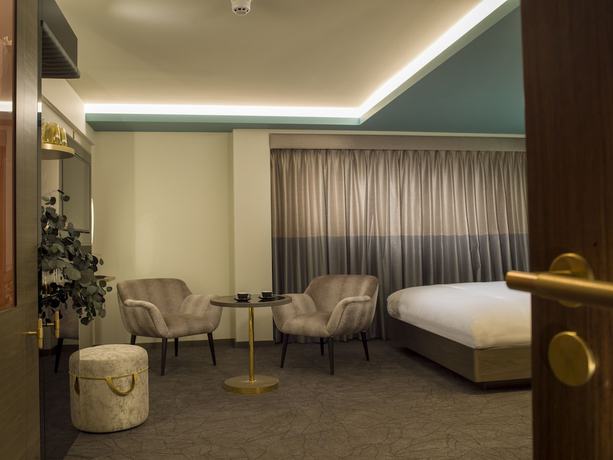 Imagen de la habitación del Hotel Middle Eight. Foto 10